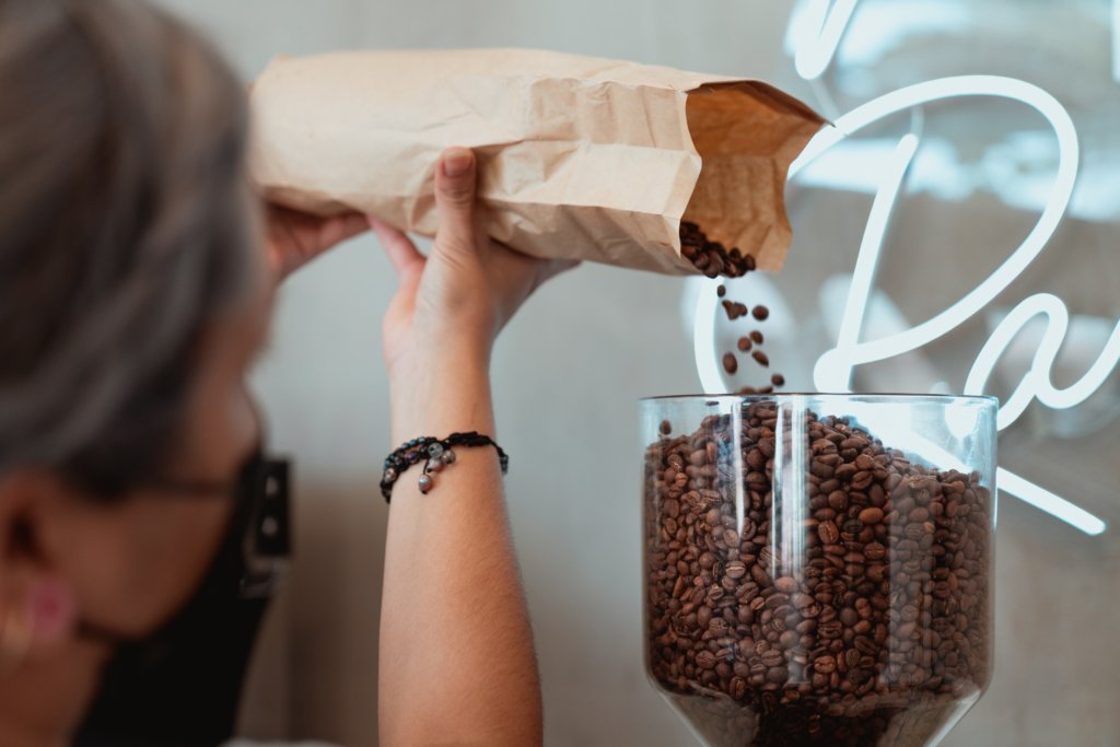 Coffee Branding: Achieving sustainable coffee packaging 4 filling coffee grinder
