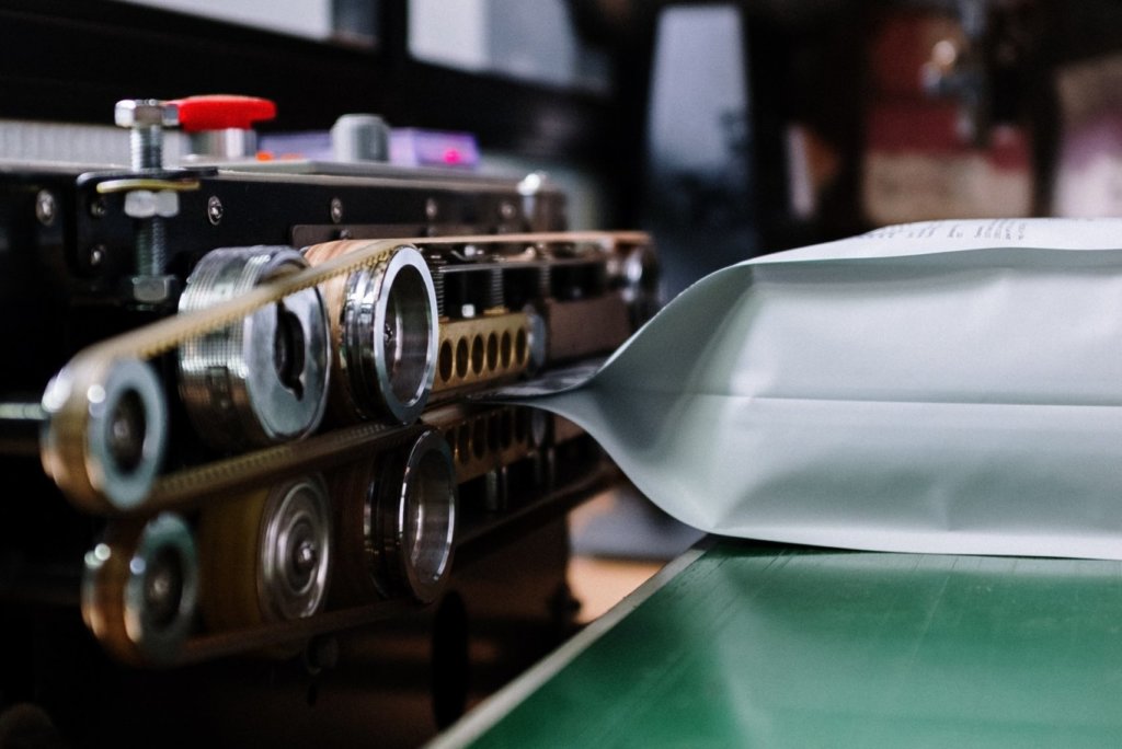 Coffee Branding: Achieving sustainable coffee packaging 5 sealing coffee packaging scaled e1625339313231